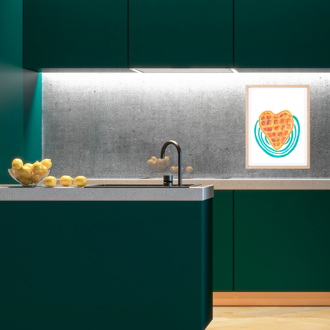 A framed original gouache artwork featuring a heart-shaped waffle on a turquoise circular background in  modern kitchen scene